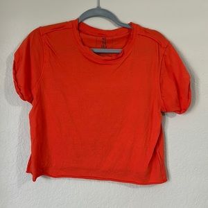 Free People Rolled hemline and cuffed t shirt S